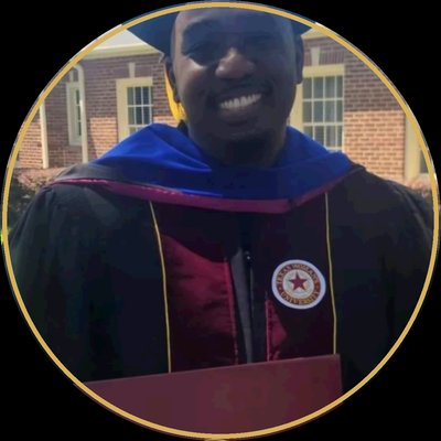 Dr. Robert McNeill in doctoral regalia
